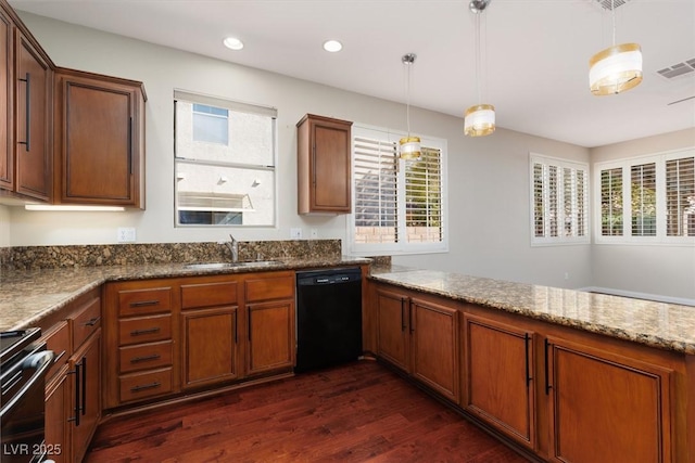 240 Jumping Springs Pl, Henderson, NV 89012 - kitchen featuring a sink, black dishwasher, stove, dark wood-type flooring, and pendant lighting