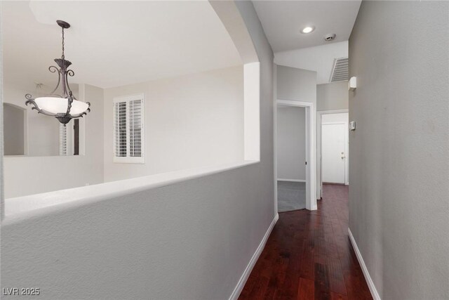 240 Jumping Springs Pl, Henderson, NV 89012 - hall with arched walkways, baseboards, wood finished floors, and recessed lighting