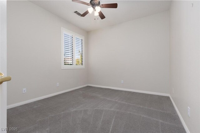 240 Jumping Springs Pl, Henderson, NV 89012 - spare room featuring ceiling fan, dark colored carpet, and baseboards