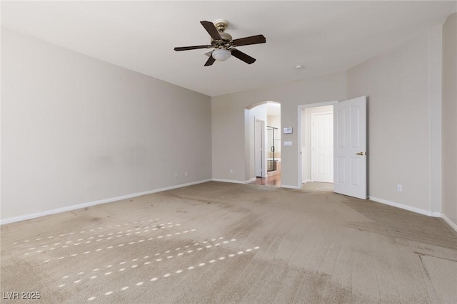 240 Jumping Springs Pl, Henderson, NV 89012 - carpeted spare room with arched walkways, ceiling fan, and baseboards