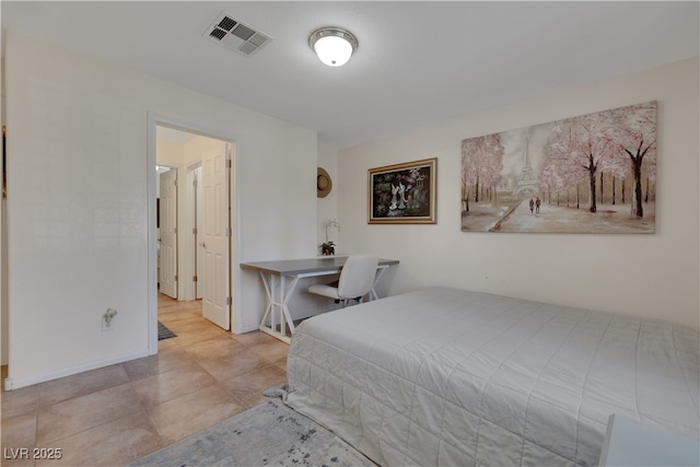 bedroom featuring visible vents and baseboards