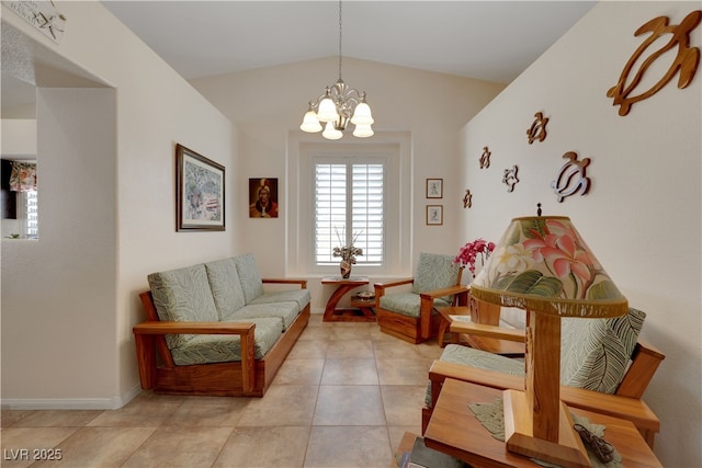 sitting room with an inviting chandelier, light tile patterned floors, lofted ceiling, and baseboards