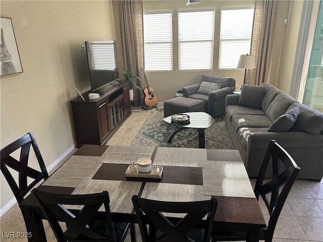 11257 Rainbow Peak Ave Unit 201, Las Vegas, NV 89135 - living area featuring light tile patterned flooring and baseboards