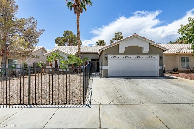 view of front facade with an attached garage, concrete driveway, stucco siding, and fence