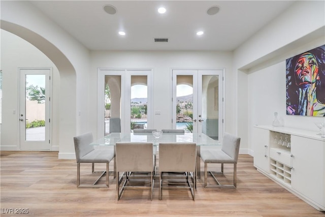 2571 Red Springs Dr, Las Vegas, NV 89135 - dining space featuring light wood finished floors, a wealth of natural light, and french doors