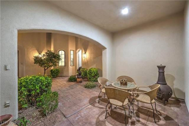 2571 Red Springs Dr, Las Vegas, NV 89135 - dining space featuring arched walkways and a textured wall