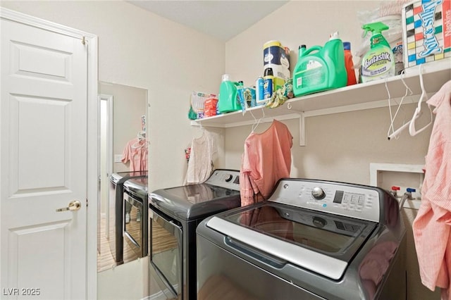 clothes washing area with laundry area and washing machine and dryer