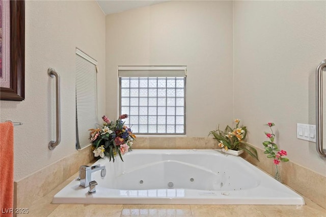 full bathroom with a whirlpool tub
