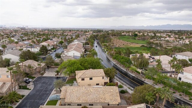 bird's eye view with a residential view and a mountain view