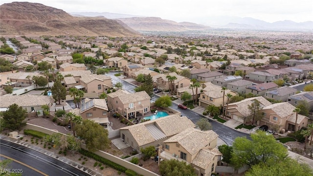drone / aerial view featuring a mountain view and a residential view