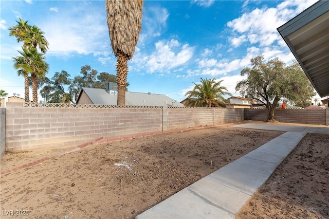 view of yard featuring a fenced backyard