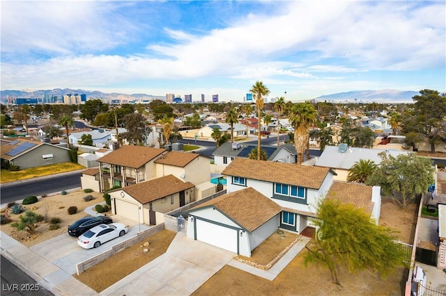 aerial view featuring a residential view and a mountain view