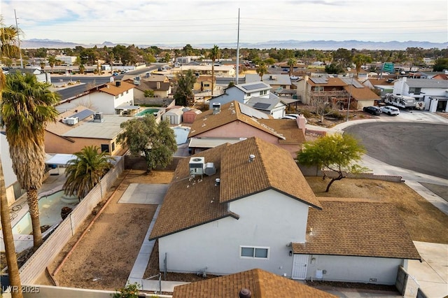 aerial view featuring a mountain view and a residential view