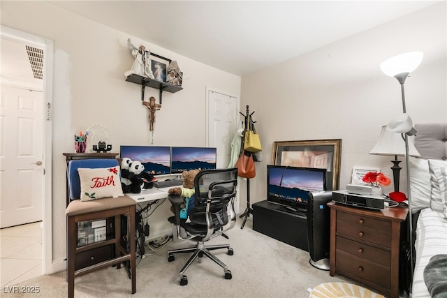 home office featuring baseboards and carpet flooring
