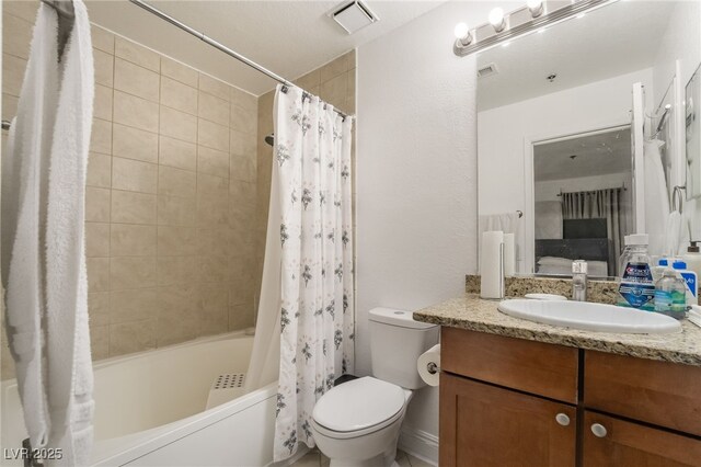 ensuite bathroom with connected bathroom, vanity, shower / tub combo with curtain, toilet, and visible vents