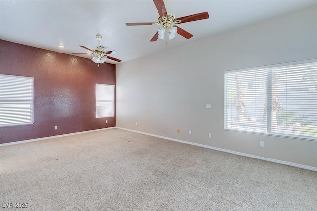 3684 Mooncrest Cir, Las Vegas, NV 89129 - empty room with ceiling fan, carpet, and healthy amount of natural light