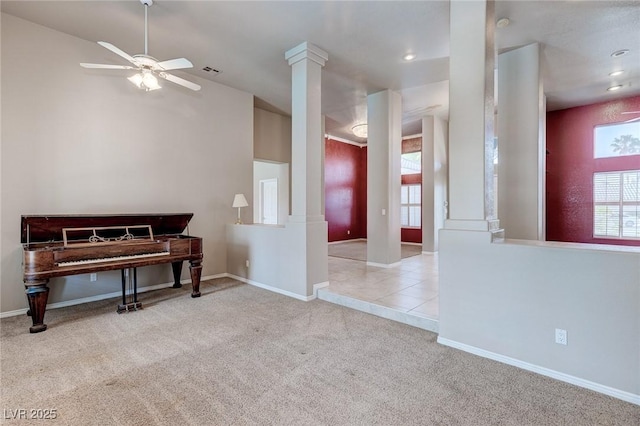 3684 Mooncrest Cir, Las Vegas, NV 89129 - living area featuring ornate columns, carpet floors, a ceiling fan, healthy amount of natural light, and recessed lighting