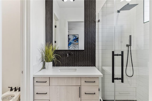 full bathroom with vanity, decorative backsplash, a bidet, and a shower stall