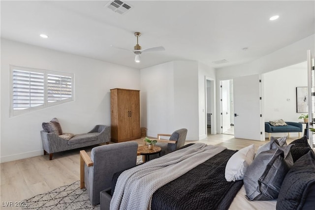 bedroom featuring recessed lighting, visible vents, and light wood-style floors