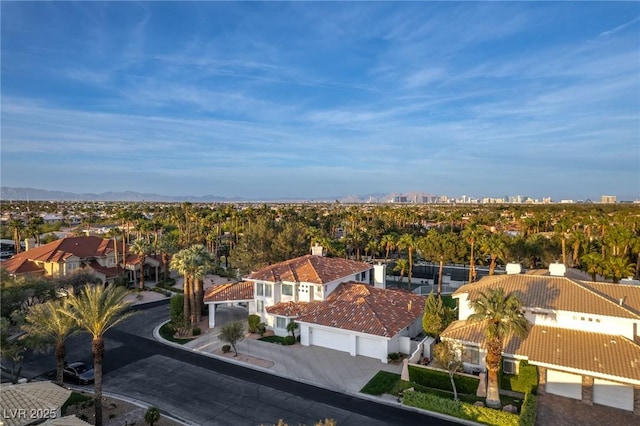 drone / aerial view featuring a mountain view and a residential view