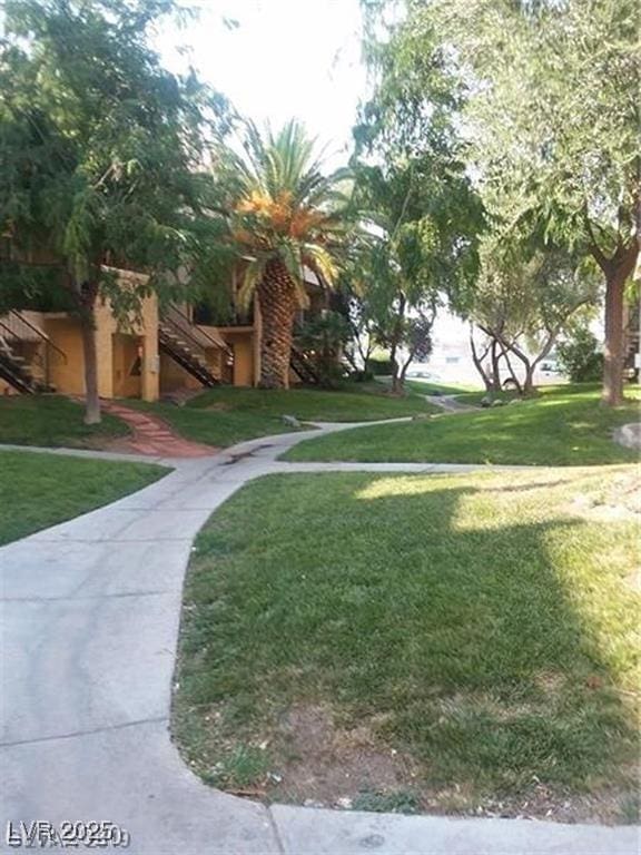 1303 Darlene Way Unit 302C, Boulder City, NV 89005 - view of community with a lawn and stairs