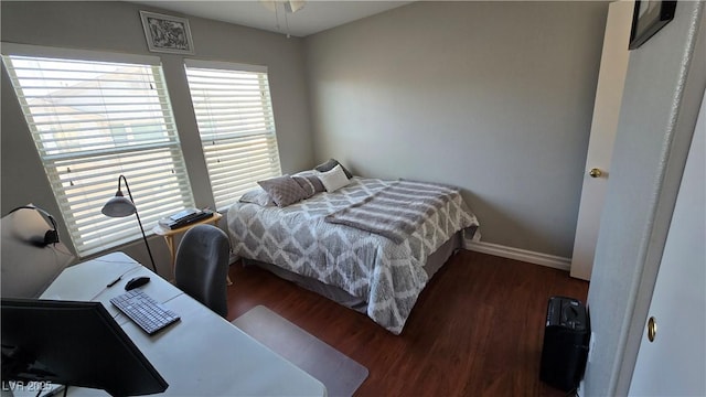 8811 Tomnitz Ave Unit 101, Las Vegas, NV 89178 - bedroom featuring wood finished floors, baseboards, and an office area