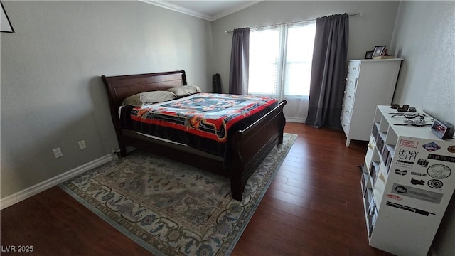 8811 Tomnitz Ave Unit 101, Las Vegas, NV 89178 - bedroom featuring crown molding, wood finished floors, and baseboards