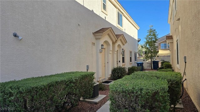 8811 Tomnitz Ave Unit 101, Las Vegas, NV 89178 - doorway to property with stucco siding