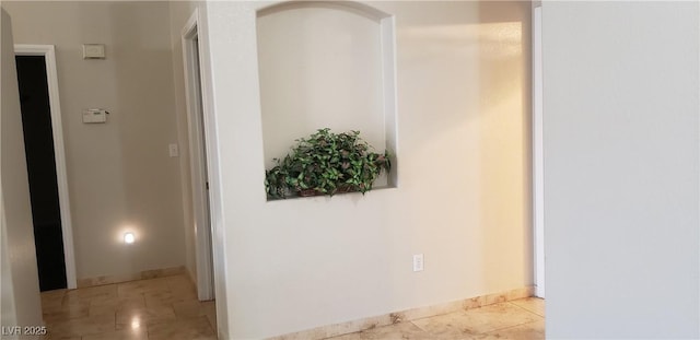 857 Lantham Pl, Las Vegas, NV 89110 - hallway featuring light tile patterned flooring and baseboards