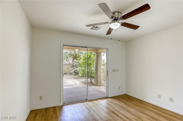 9966 Mystic Moss St, Las Vegas, NV 89183 - unfurnished room featuring visible vents, ceiling fan, wood finished floors, and baseboards