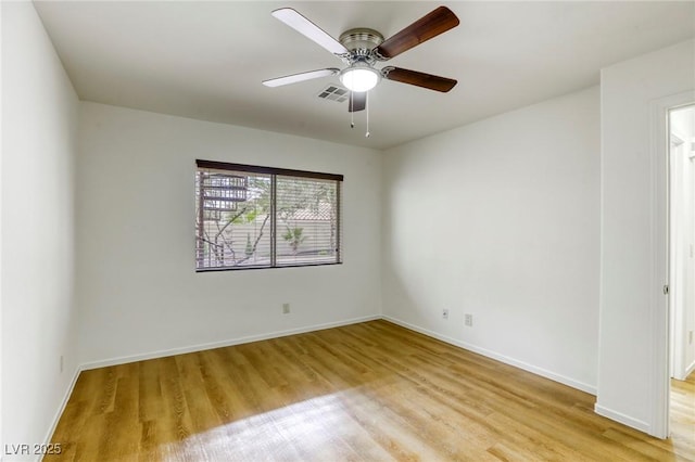 9966 Mystic Moss St, Las Vegas, NV 89183 - empty room featuring light wood-style floors, a ceiling fan, visible vents, and baseboards