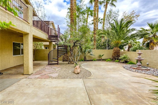 9966 Mystic Moss St, Las Vegas, NV 89183 - view of patio / terrace featuring fence and stairs
