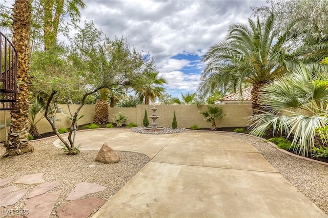 9966 Mystic Moss St, Las Vegas, NV 89183 - view of yard with a fenced backyard and a patio area