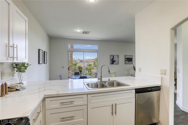 9966 Mystic Moss St, Las Vegas, NV 89183 - kitchen featuring a sink, stove, visible vents, a peninsula, and stainless steel dishwasher