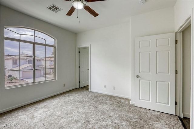 9966 Mystic Moss St, Las Vegas, NV 89183 - unfurnished bedroom with carpet, visible vents, multiple windows, and baseboards