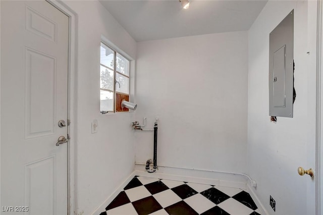 709 New Mexico St, Boulder City, NV 89005 - laundry room featuring tile patterned floors, baseboards, electric panel, and laundry area