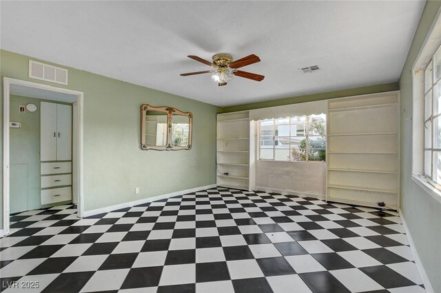 709 New Mexico St, Boulder City, NV 89005 - spare room featuring a ceiling fan, visible vents, baseboards, and plenty of natural light