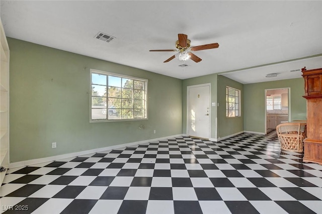 709 New Mexico St, Boulder City, NV 89005 - empty room featuring a ceiling fan, visible vents, tile patterned floors, and baseboards