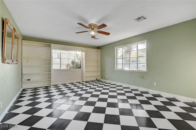 709 New Mexico St, Boulder City, NV 89005 - empty room featuring ceiling fan, visible vents, a healthy amount of sunlight, and baseboards