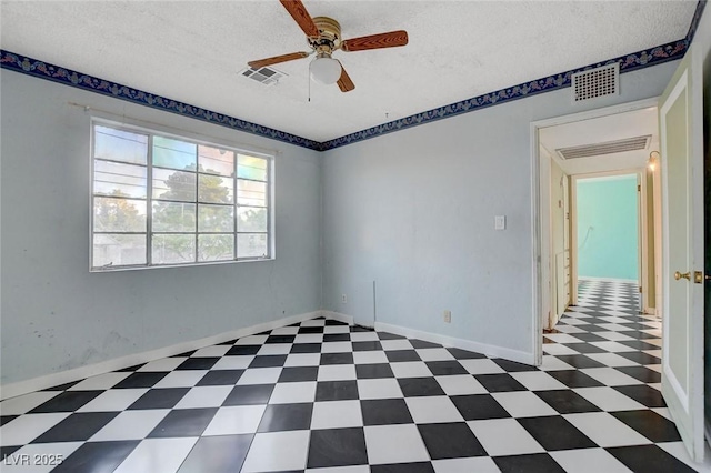 709 New Mexico St, Boulder City, NV 89005 - spare room with a textured ceiling, visible vents, ceiling fan, and baseboards