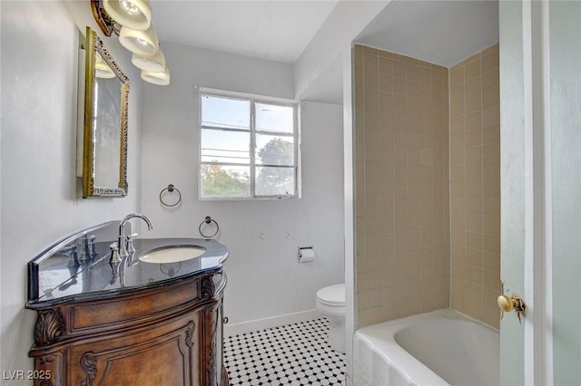 709 New Mexico St, Boulder City, NV 89005 - bathroom with baseboards, toilet, tile patterned flooring, and vanity