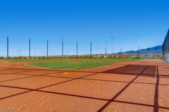 surrounding community with a mountain view