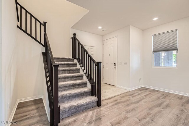 2862 Starling Summit St, Henderson, NV 89044 - staircase featuring wood finished floors, recessed lighting, and baseboards