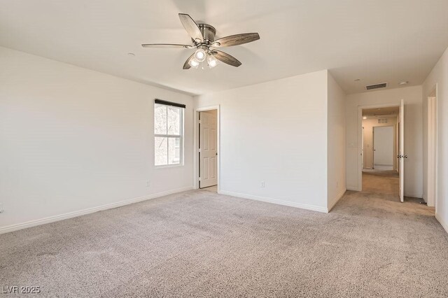 2862 Starling Summit St, Henderson, NV 89044 - empty room featuring light colored carpet, a ceiling fan, and baseboards