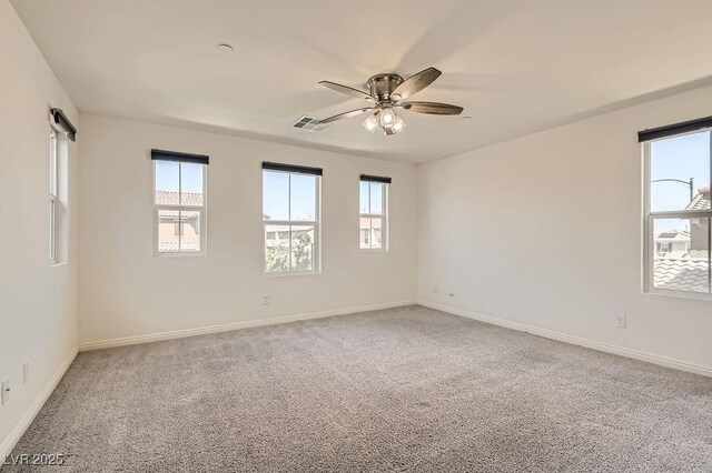 2862 Starling Summit St, Henderson, NV 89044 - carpeted spare room featuring plenty of natural light, ceiling fan, and baseboards