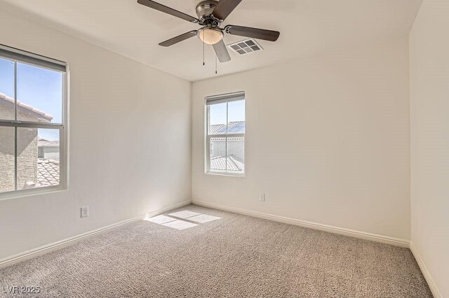 2862 Starling Summit St, Henderson, NV 89044 - unfurnished room with light colored carpet, baseboards, and a ceiling fan