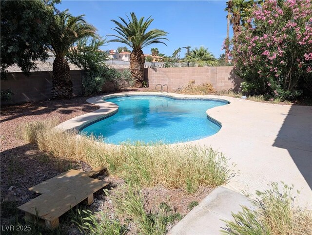 2716 Knightsbridge Rd, Henderson, NV 89074 - view of swimming pool with a fenced in pool, a fenced backyard, and a patio area
