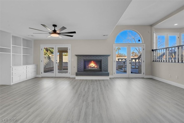 8232 Ocean Terrace Way, Las Vegas, NV 89128 - unfurnished living room featuring wood finished floors, french doors, ceiling fan, and baseboards