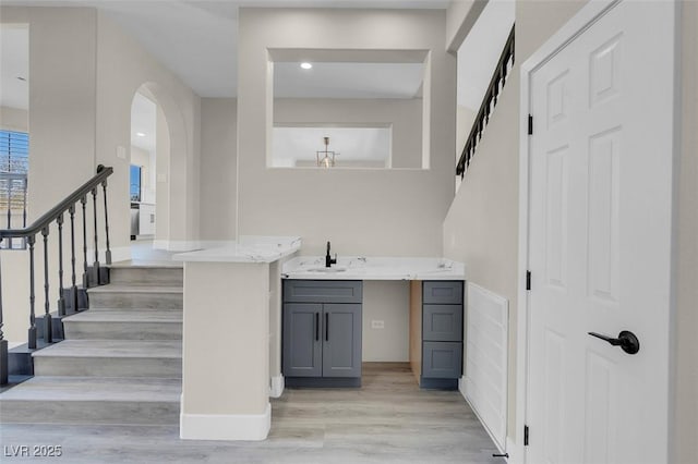 8232 Ocean Terrace Way, Las Vegas, NV 89128 - interior space featuring wood finished floors and arched walkways