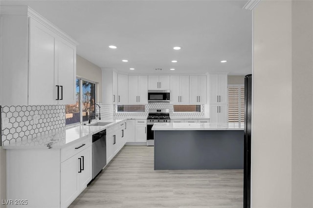 8232 Ocean Terrace Way, Las Vegas, NV 89128 - kitchen with recessed lighting, white cabinetry, and stainless steel appliances